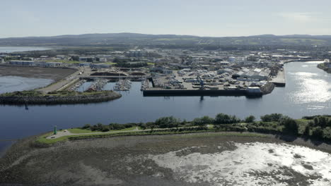 An-aerial-view-of-Inverness-city,-the-River-Ness-and-leisure-harbour-area-on-a-sunny-summer's-morning