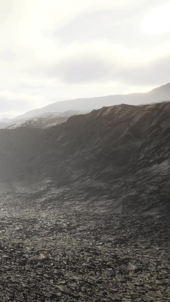 Landscape view of rocky terrain under cloudy sky in a remote area