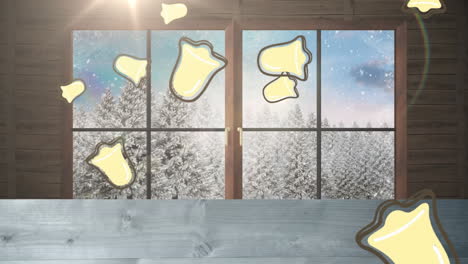 multiple chritsmas bell icons falling over wooden plank and window frame against winter landscape