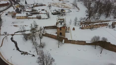 Ruins-of-Ancient-Livonian-Order's-Stone-Medieval-Castle-Latvia-Aerial-Drone-Top-Shot-From-Above