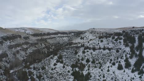 Slow-drone-tracking-through-snowy-canyon