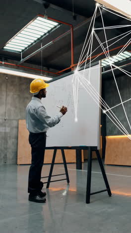 engineer working on a virtual network diagram