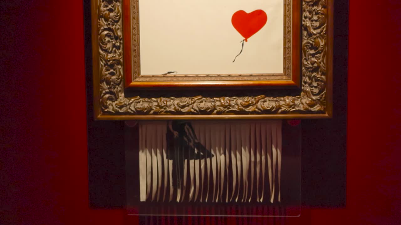 Banksy's Shredded Balloon Girl: Close-Up View of the Artwork