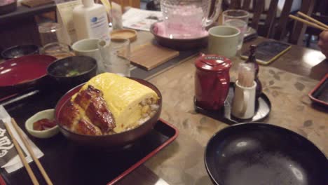 eel fish served at a traditional restaurant in kyoto japan pale vintage colors