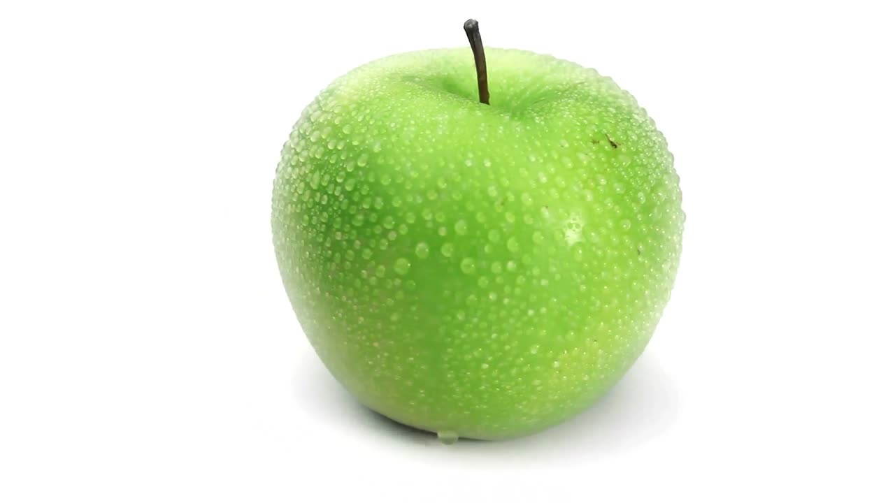 el giro de la manzana verde húmeda