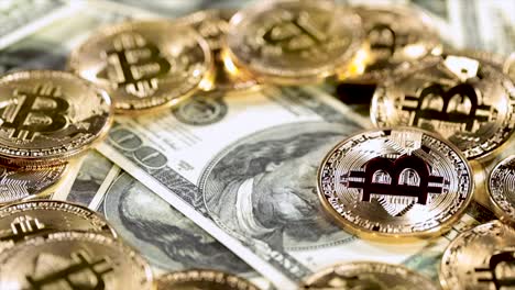 gold bit coin btc coins and dollar bills.