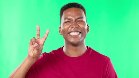 green screen, peace and face of man in studio