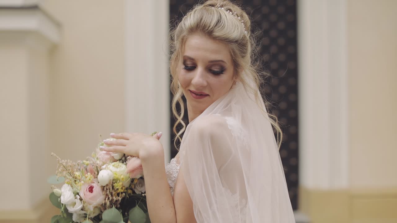 Beautiful and lovely bride. Pretty and well-groomed woman. Slow motion