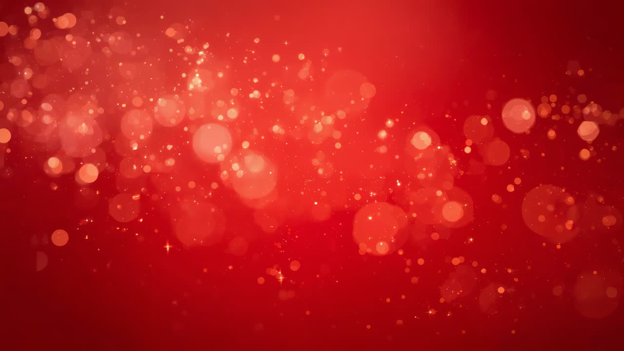 Shimmering field of bokeh and sparkles brightening as frames flow to create warm red glow