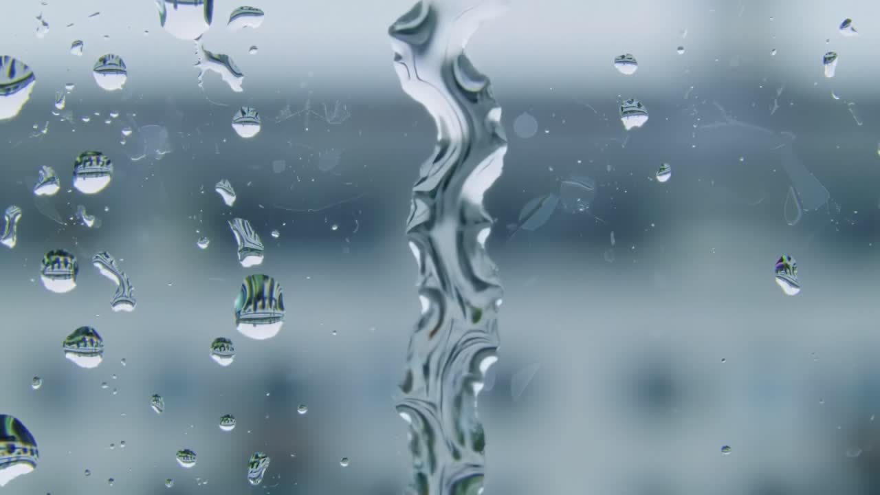 Glistening Water Droplets on Transparent Surface, Capturing Intricate Patterns and Reflections During a Rainy Day, Bringing Nature's Beauty Indoors
