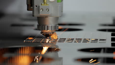 CNC-Laser-cutting-of-metal,-modern-industrial-technology.