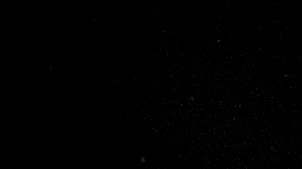 겨울, 검은 바탕에 고립 된 눈이 떨어집니다.