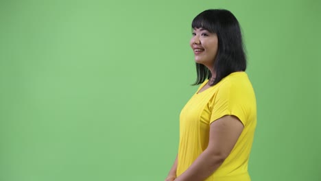 profile view of beautiful asian woman smiling