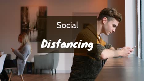 Animation-of-a-sign-SOCIAL-DISTANCING-over-Caucasian-people-using-their-smartphones