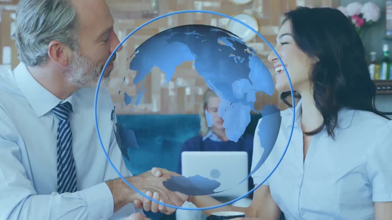 비즈니스 사람들이 손을 흔들고 지구가 회전하고 있습니다.