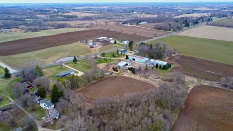 aerial flyover of a farm in the wisconsin countryside