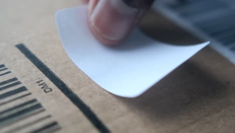 applying a label to a cardboard box