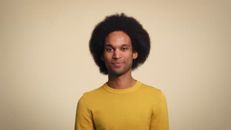 Studio-portrait-of-smiling-African-man