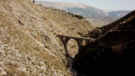 drone view of the ali pasha bridge in gjirokaster, albania, balkans, europe