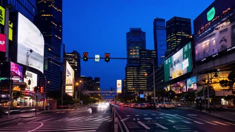 a busy city street at night