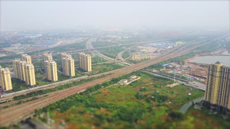 day time wuhan city traffic junction aerial panorama 4k tilt shift china