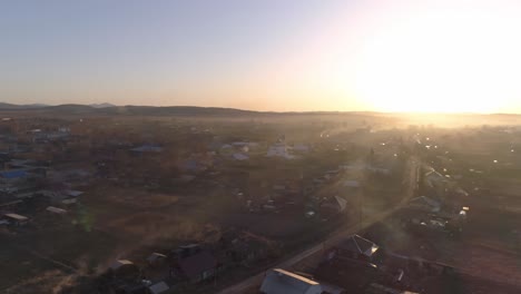 aerial view of a village at sunrise