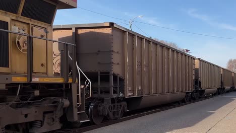 Union-Pacific-freight-train-going-straight-down-the-middle-of-the-road-in-Bellevue-in-Iowa