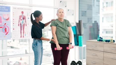 Women-physiotherapy-or-patient-with-dumbbells