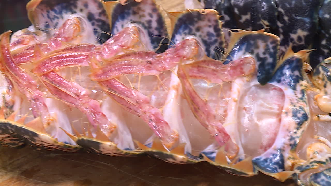 Close up of a cooked lobster tail section
