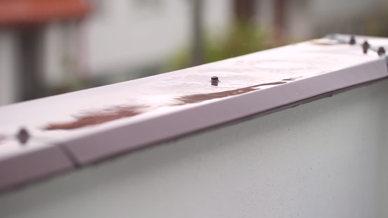 Raindrops on Leaking Window Sill