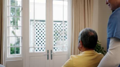 Senior,-man-in-wheelchair-and-nurse