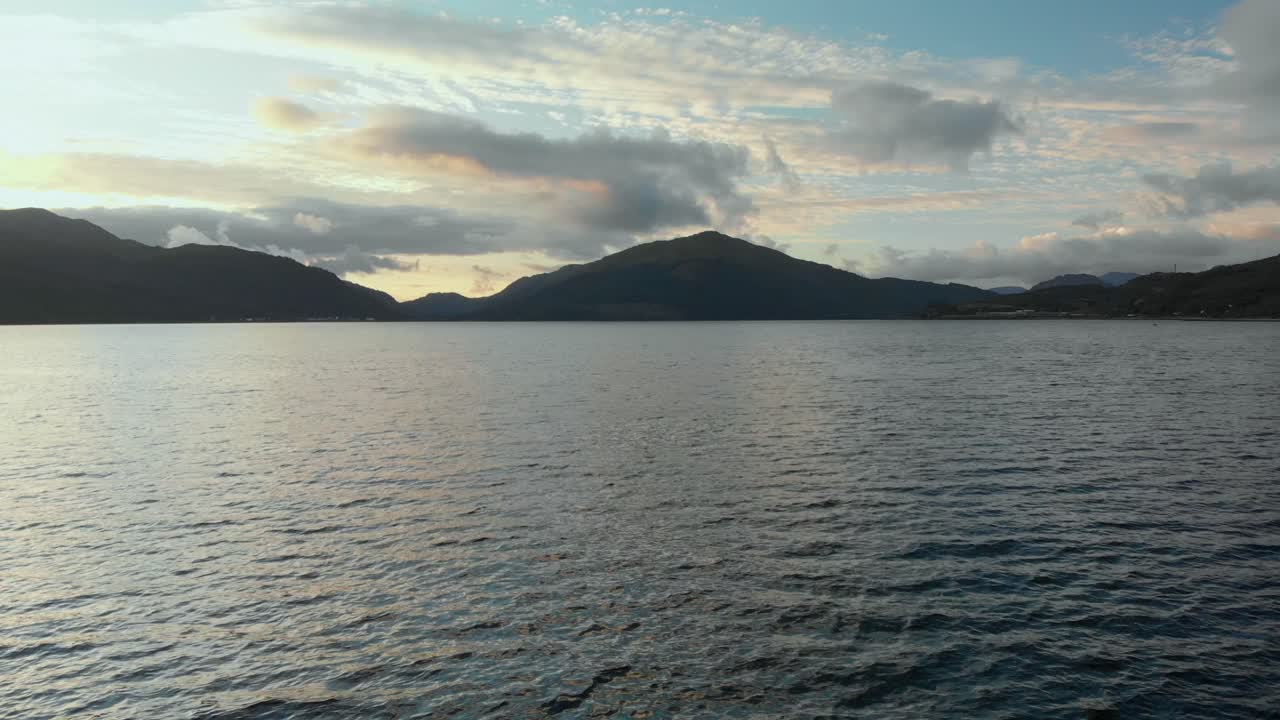 Aerial Footage of Loch Long and the surrounding mountains in West Scotland. Loch Long extends from the Firth of Clyde in Argyll and Bute, Scotland