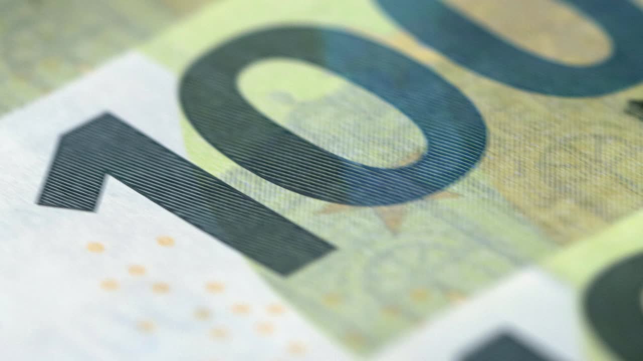 Looped money printing press. Inflation concept. Counting of cash euro. Macro. Calculation of 100 euro bill banknotes. Finance and investment. Rich business economy. Currency exchange