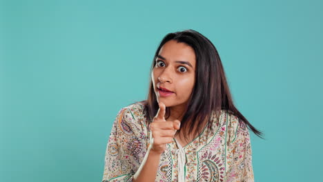 Irked-woman-fighting-with-boyfriend,-doing-scolding-gesturing,