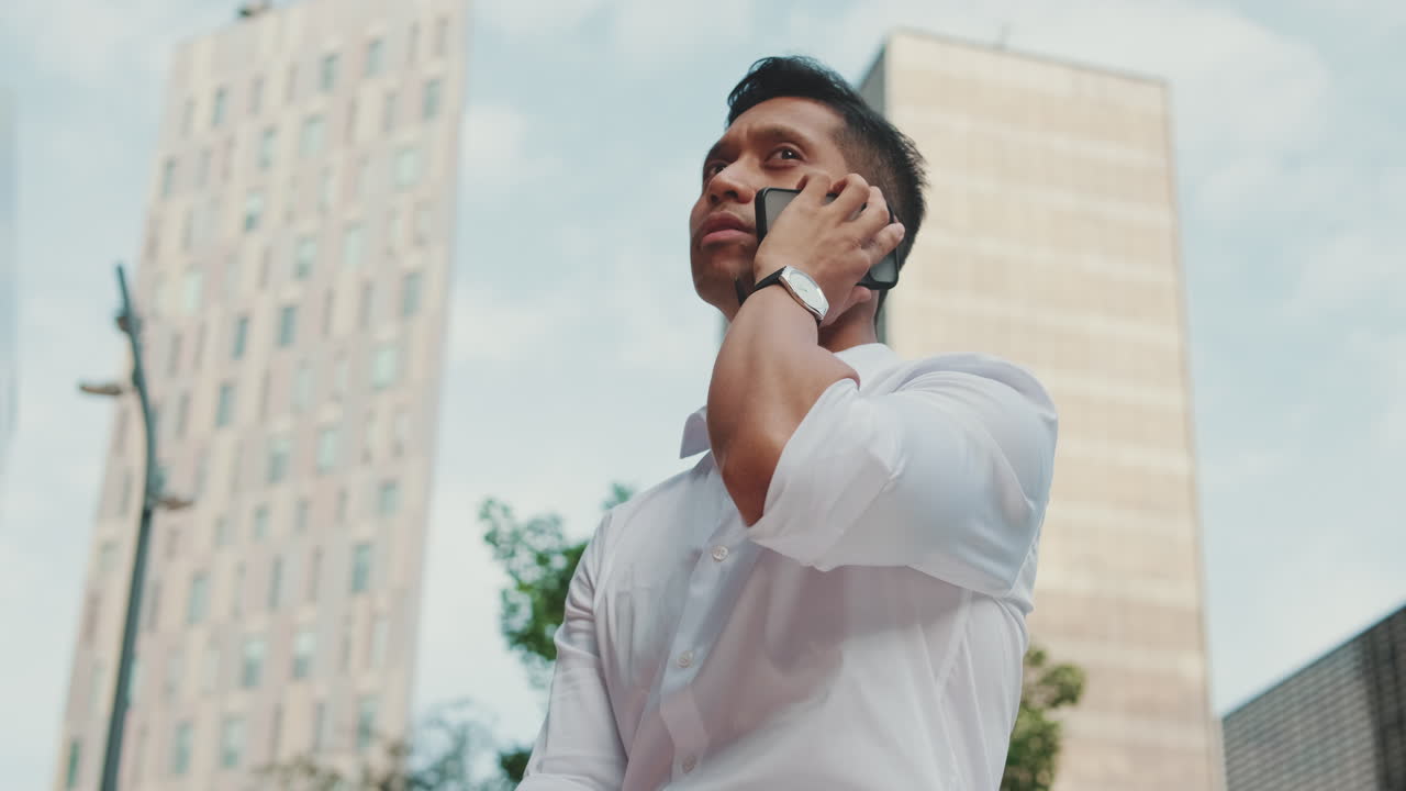 Man on a phone call in the city