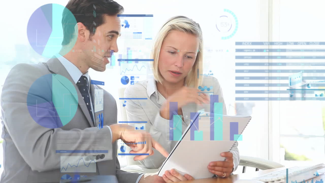 Discussing data with charts, business professionals in meeting room using animation