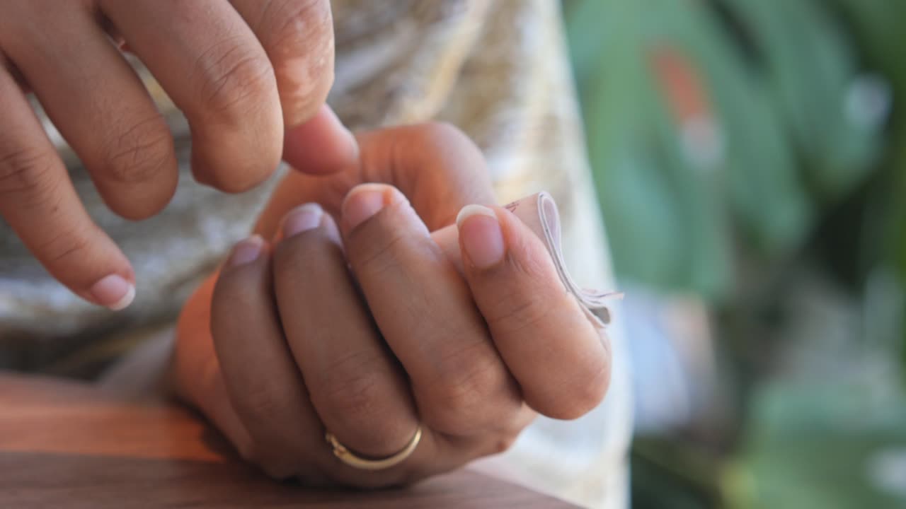 Hand Folding Turkish Lira with Rubber Band