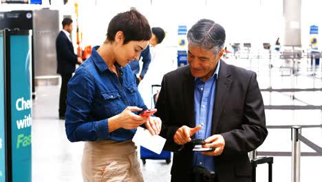 male and female commuter interacting with each other