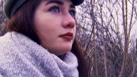 woman in winter forest