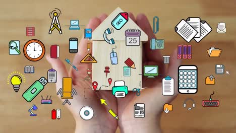 animation of business icons and data processing over hands holding wooden house