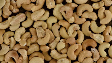 cashew nuts on a rotating plate (seamless loopable)
