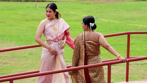 two women in traditional thai attire