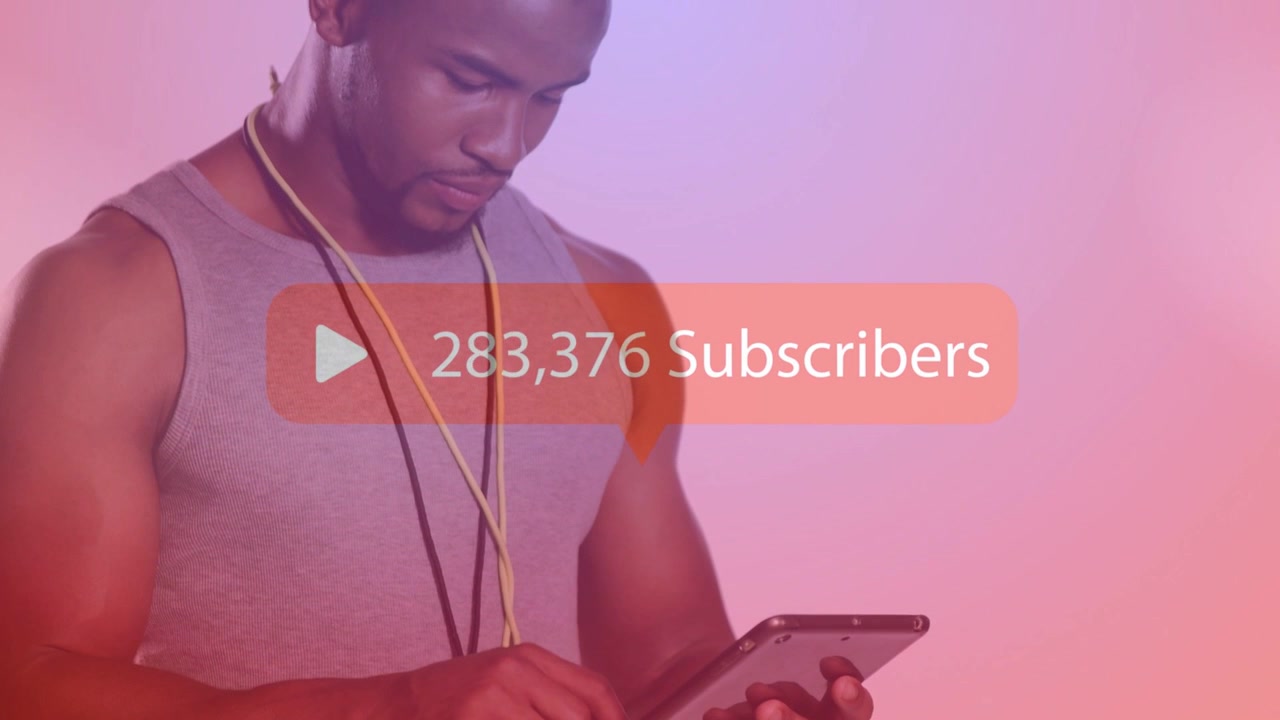 Man tapping tablet starting sub badge with play icon, numbers climbing over chest during tech demo