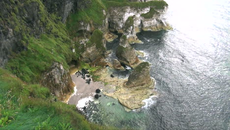 aerial view of rocky cliffs and ocean in ireland