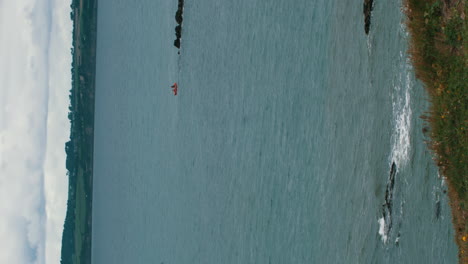 Couple-kayaking-in-Ocean-at-french-west-coast