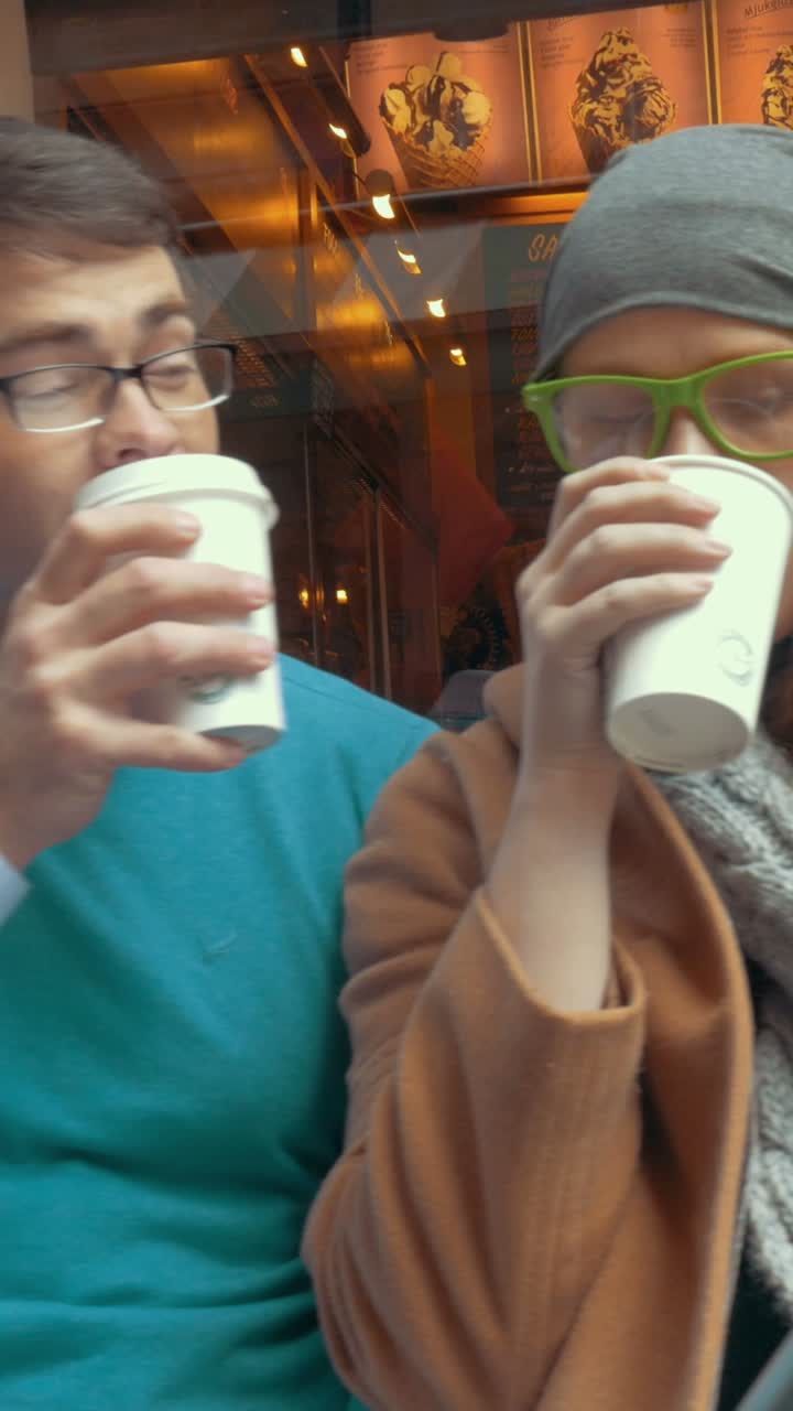 People enjoying coffee at a cafe
