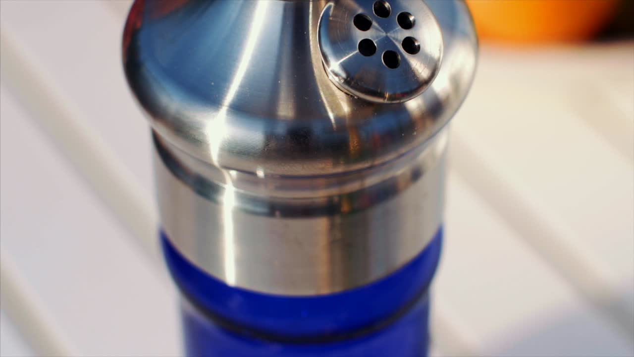 silver plated hookah detail. bubbling of hookah juice