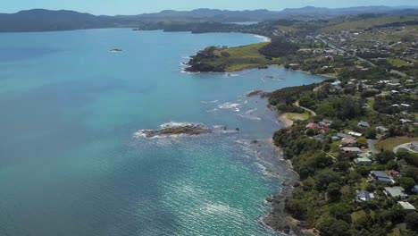 aerial view of the coast at cable bay and coopers beach in new zealand