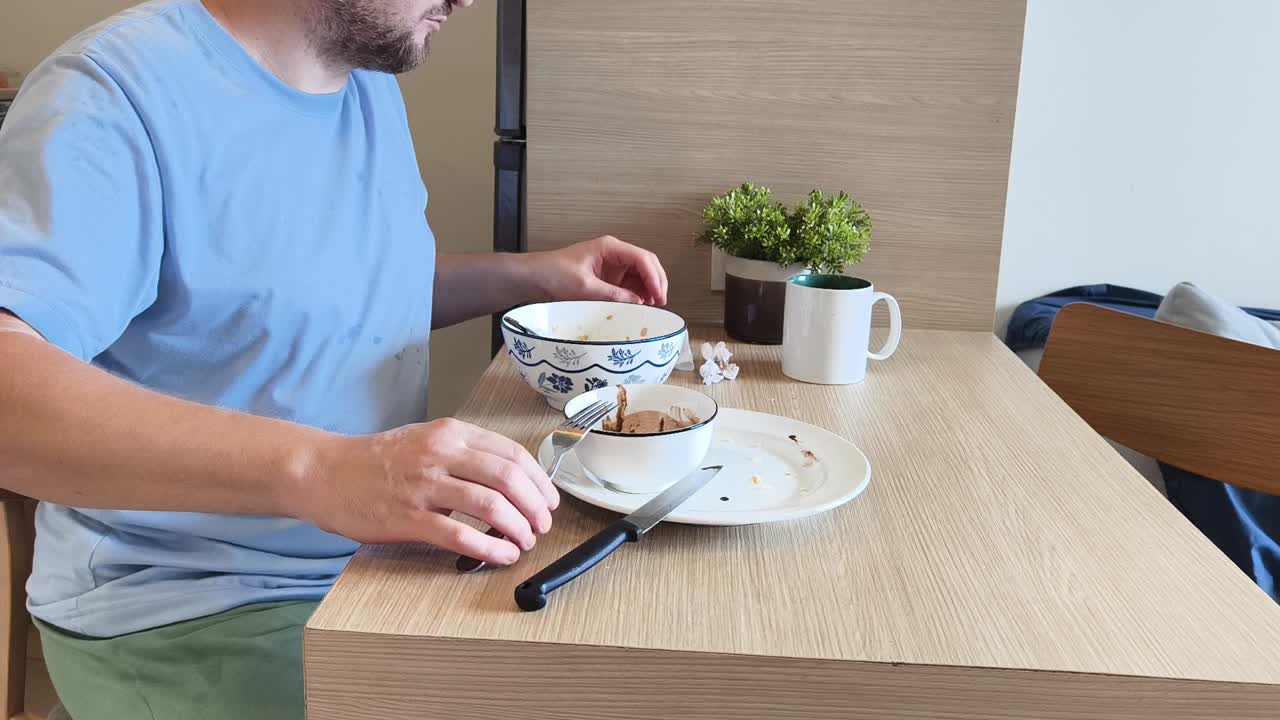 A person is having a meal at a table