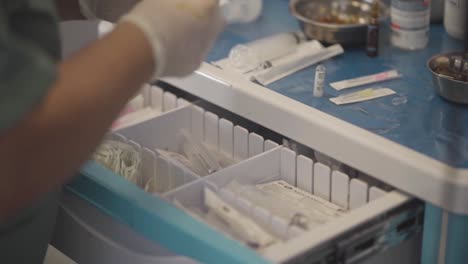 nurse meticulously preparing medications for patient administration, exemplifying compassionate care and precise medical attention